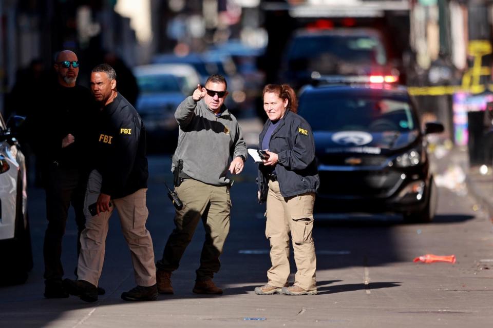 PHOTO: Law enforcement officers from multiple agencies work the scene in the French Quarter, January 1, 2025 in New Orleans, Louisiana. (Michael Democker/Getty Images)