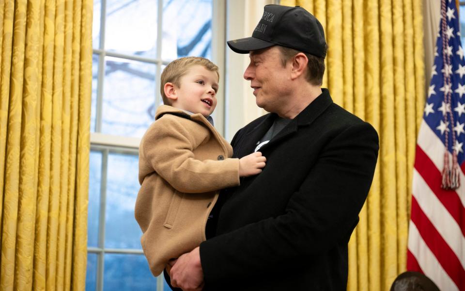 Elon Musk carried his son X Æ A-Xii in the Oval Office earlier this month