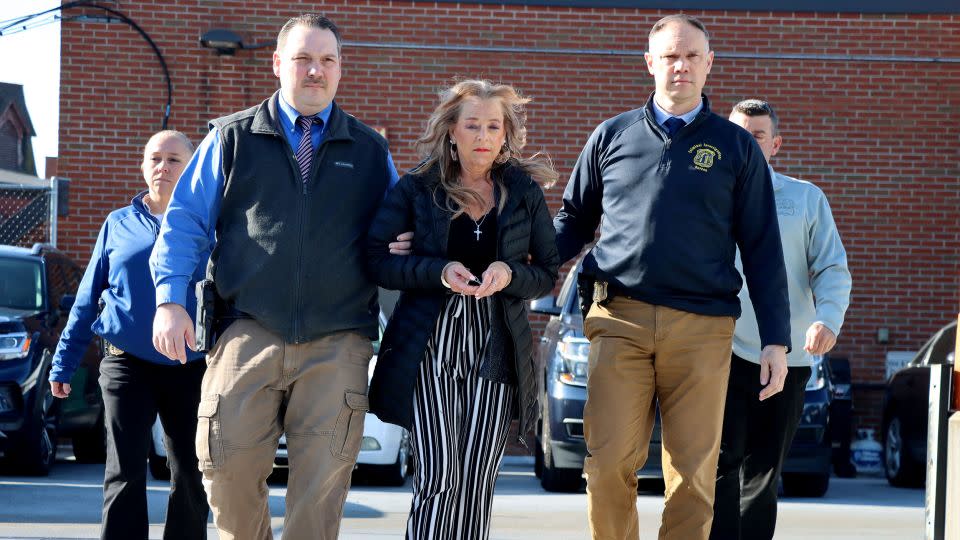 Kimberly Sullivan is taken into custody Wednesday. - Waterbury Police Department/AP