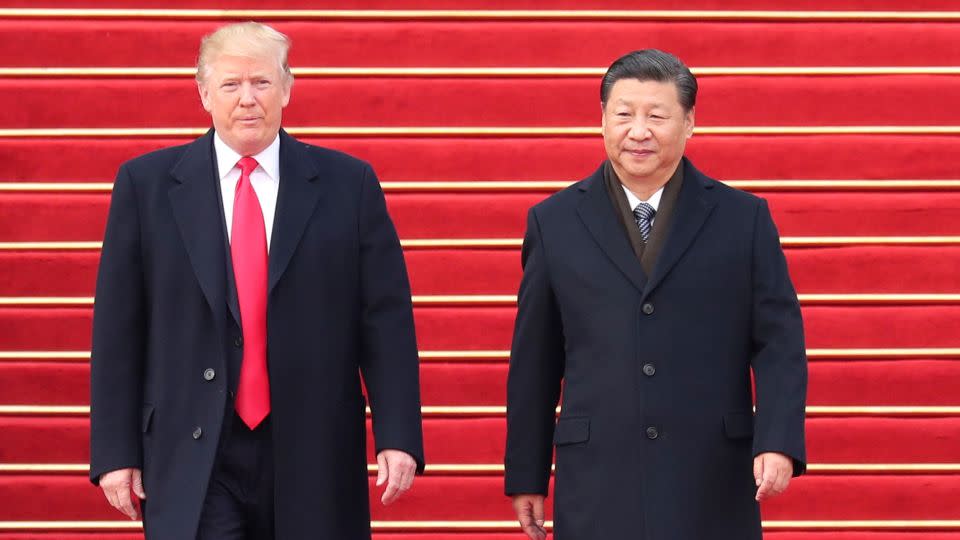 Chinese President Xi Jinping, right, holds a grand ceremony to welcome US President Donald Trump in Beijing, on November 9, 2017. - Pang Xinglei/Xinhua News Agency/Getty Images